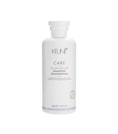 Keune Care Silver Savior Shampoo 300ml Μωβ σαμπουάν για ψυχρά ξανθά μαλλιά - διατηρεί τις ξανθές, ασημί, λευκές ή λιλά αποχρώσεις φρέσκες και φωτεινές - εξουδετερώνει τις χάλκινες και κίτρινες ζεστές.